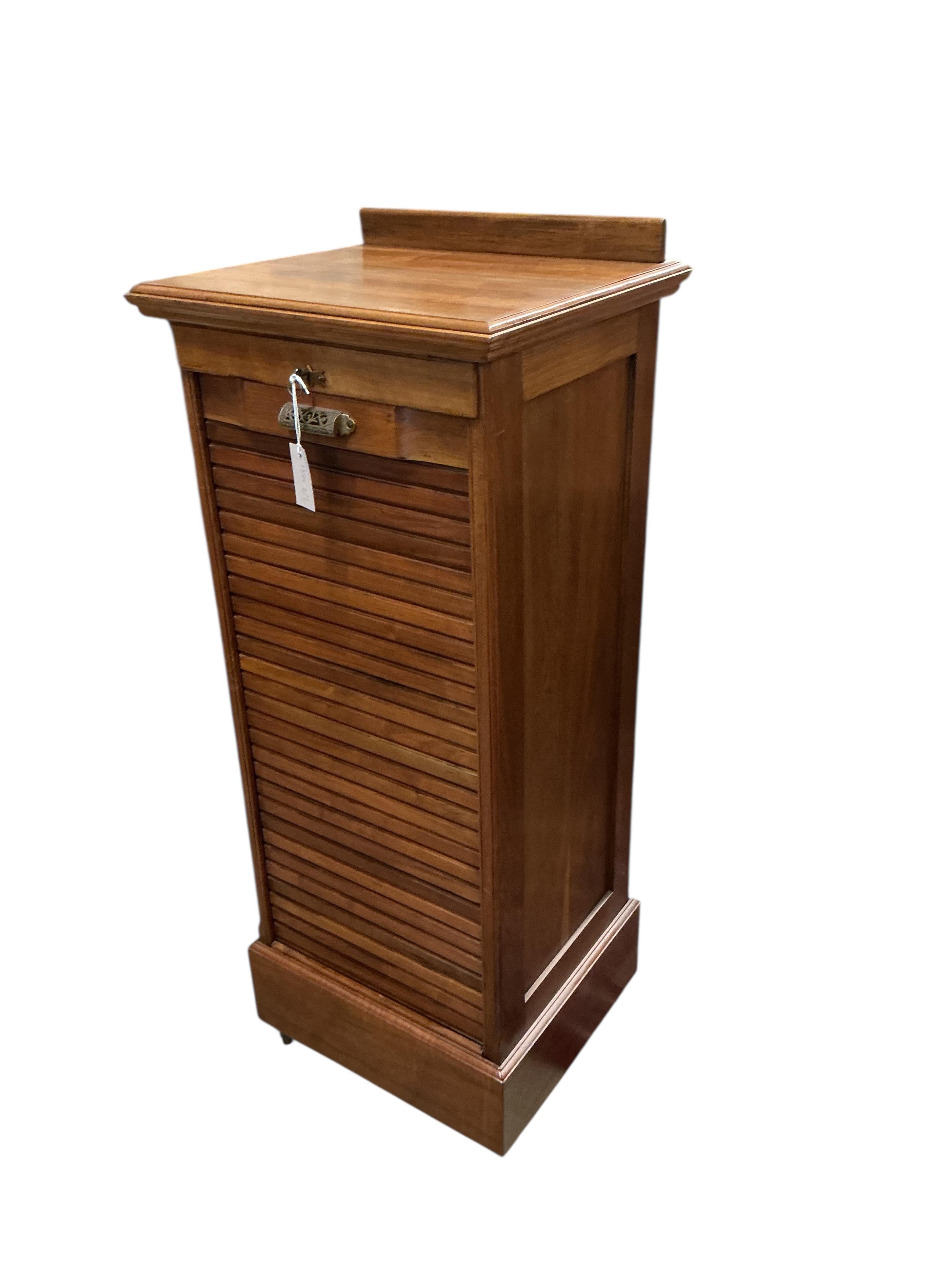 An early 20th century walnut tambour filing cabinet, width 50cm, depth 45cm, height 124cm